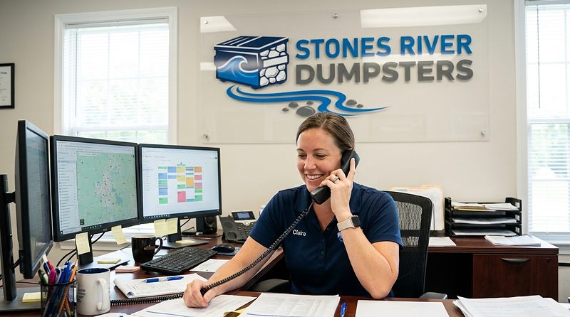 Stones River Dumpsters dispatch taking a call