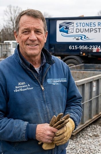 Alan, Stones River Dumpsters yard supervisor, with a roll-off container